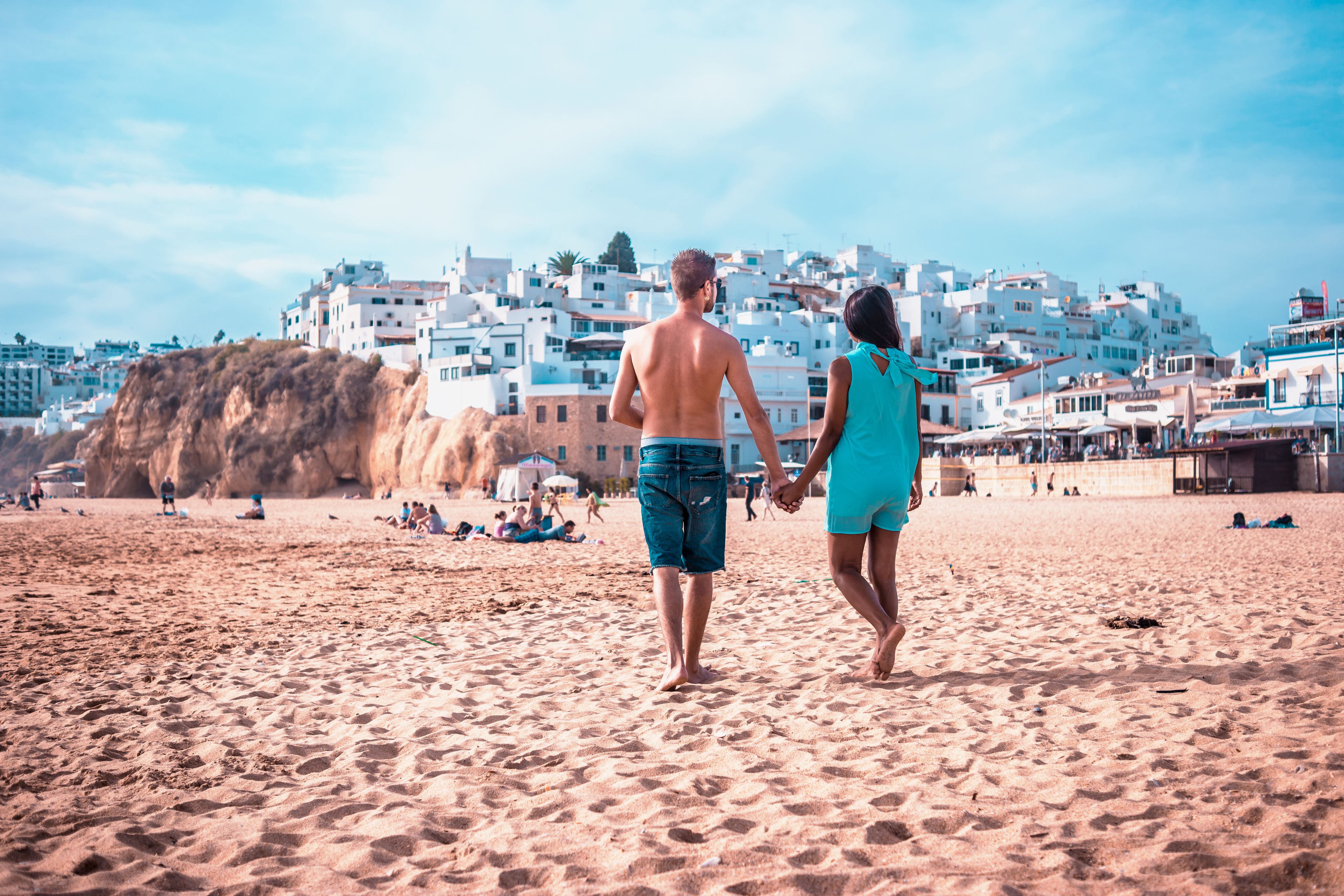 Couple walking in a luxury property with scenic view
