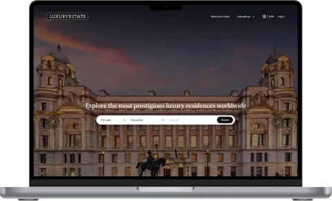 Luxuryestate.com property portal shown on a laptop